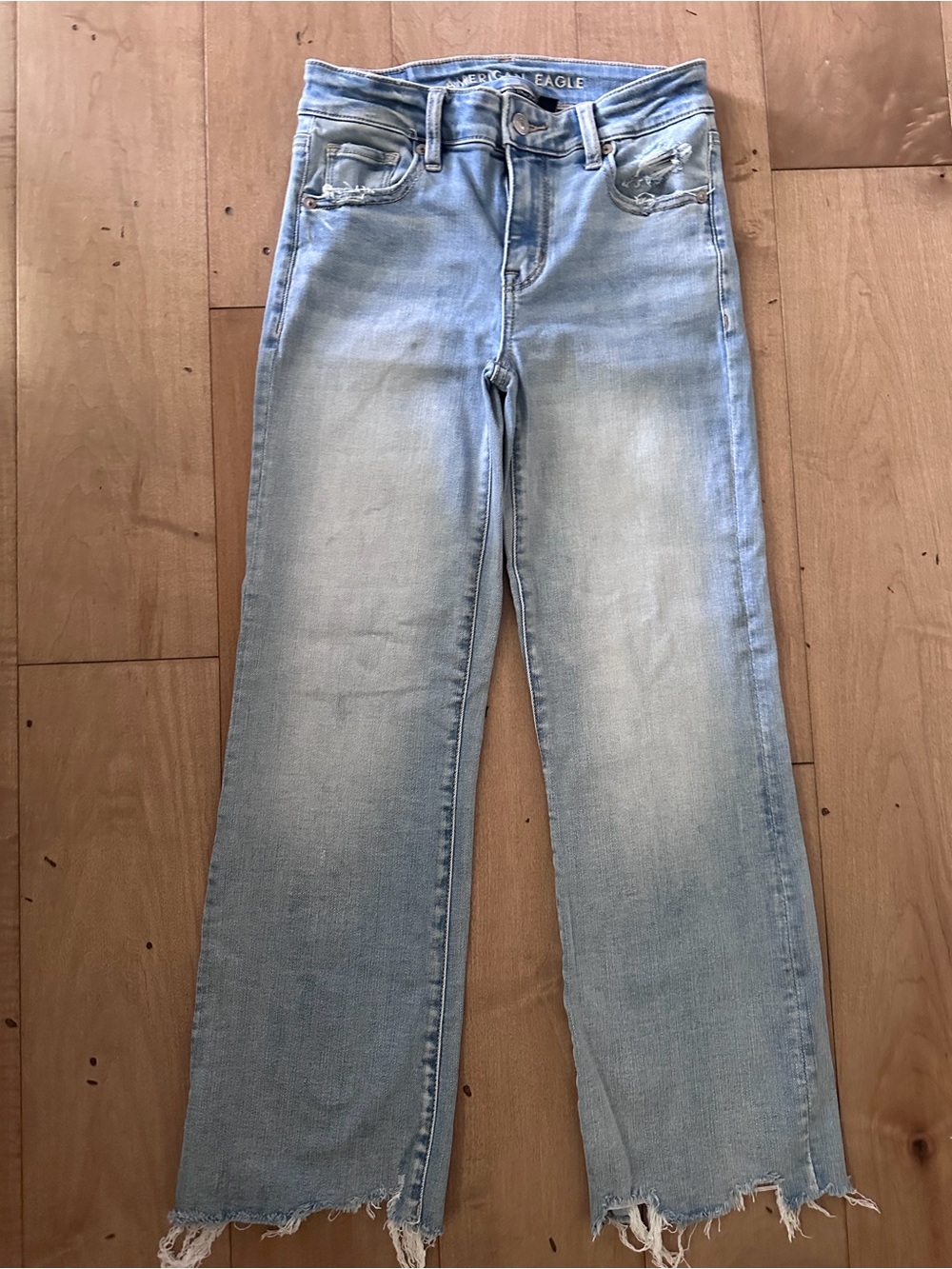 American Eagle Outfitters Light Blue Flare Jeans with Frayed Hem